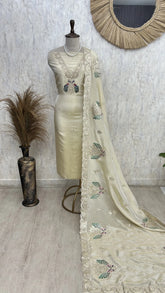 Tissue unstitched suit with peacock motif