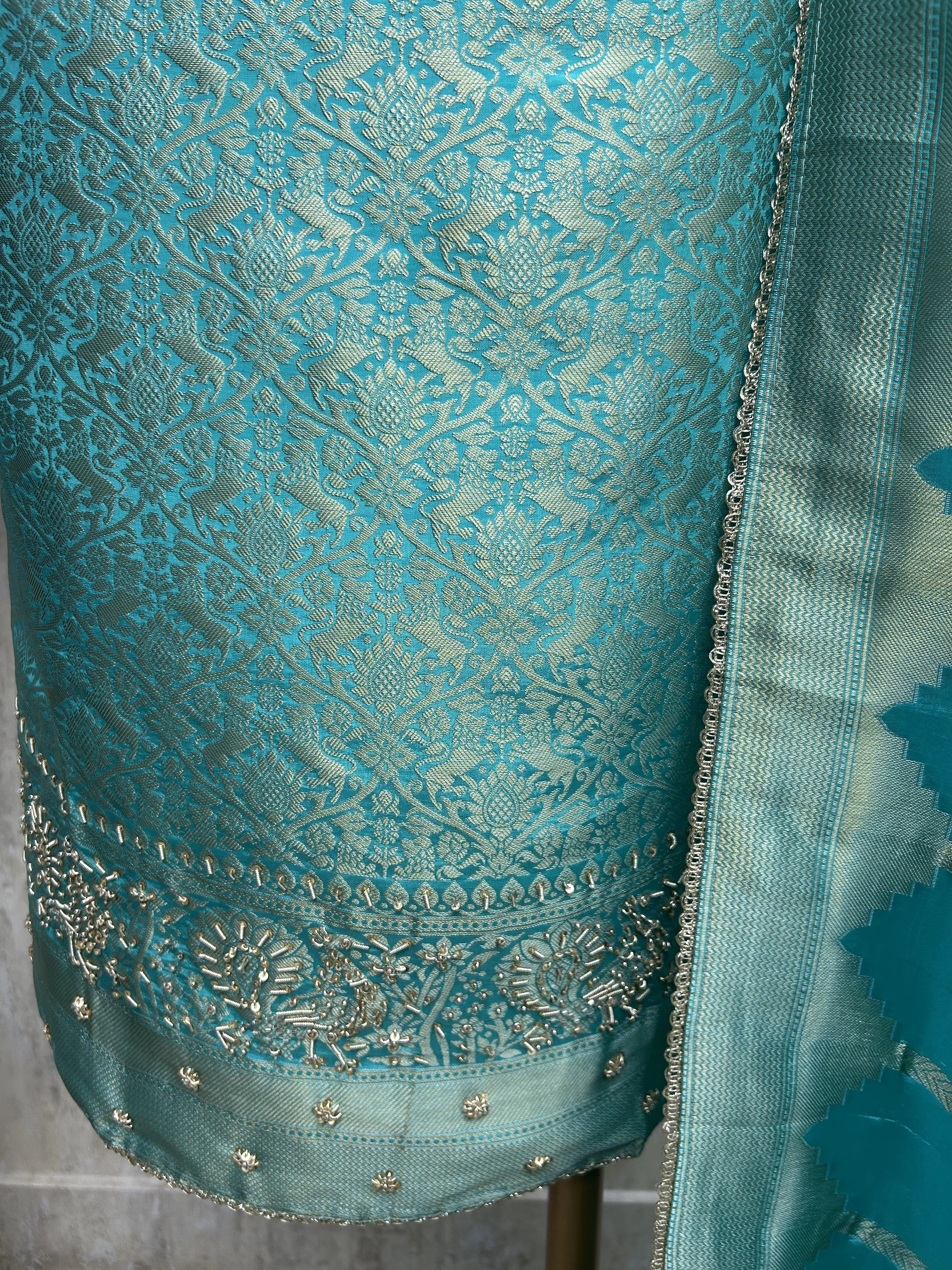 Brocade Silk Unstitched Suit Set featuring Silk Dupatta