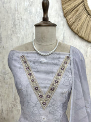 Linen Unstitched Suit Set With Embroidered Neckline & Woven Hemline